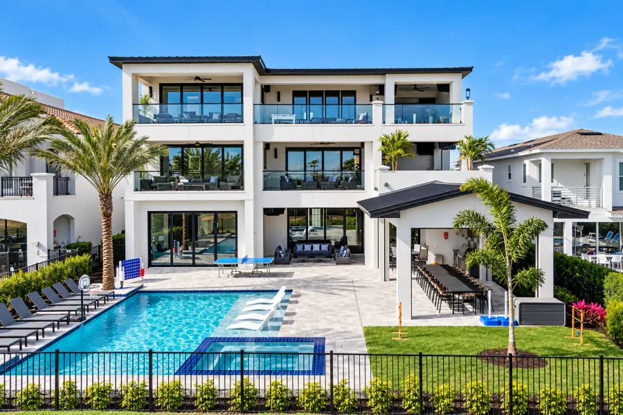 Luxury vacation home with a private pool and spacious outdoor dining area